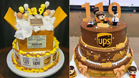 The image shows two UPS themed cakes decorated with delivery motifs and figurines. The cake on the left resembles a parcel with a printed shipping label and white tissue paper, featuring multiple UPS shield designs around the base. The cake on the right is a two-tier chocolate cake with UPS shields, small delivery truck figures, and large numeric toppers reading 119. Both cakes are brightly colored with yellow and brown accents, confetti, and playful party details.