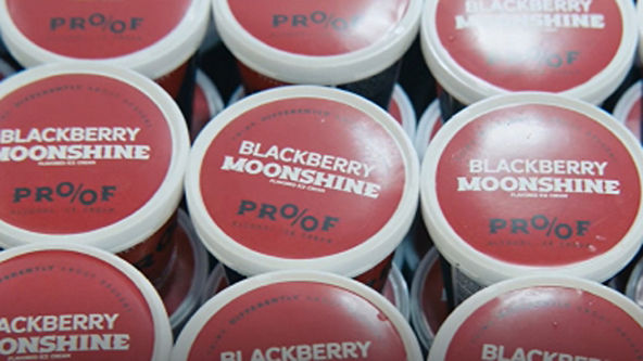 Multiple containers of Proof Blackberry Moonshine ice cream