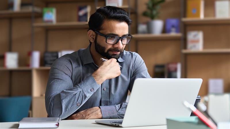 Man looking at laptop