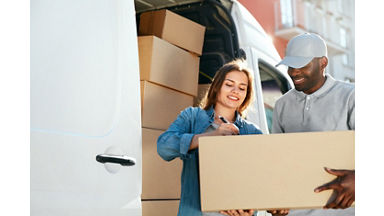 Delivery Service. Courier Delivering Package To Woman Near Car