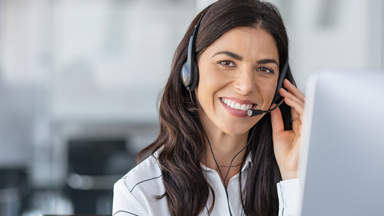 Female customer support representative with headset