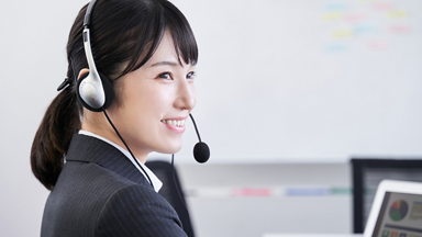 Female customer service representative wearing a headset 