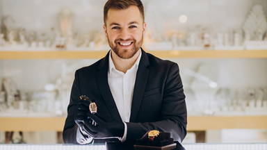 Male employee showing a watch