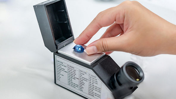 Blue gemstone being scanned