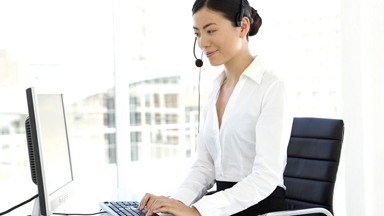 Female service representative wearing a headset